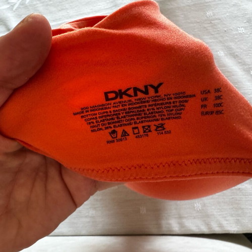 DKNY bra like new, sports style, coral with purple straps, 85C