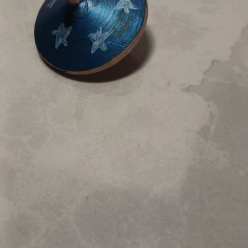 Wooden spinning top used