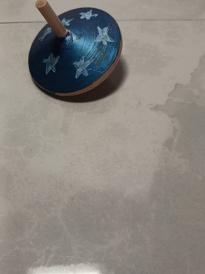Wooden spinning top used