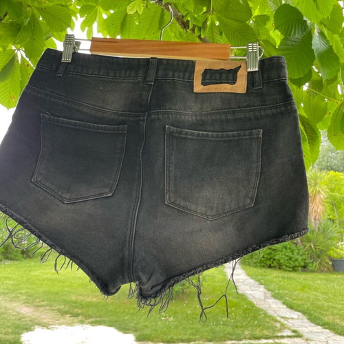 Only black denim shorts with rips like new, size 30