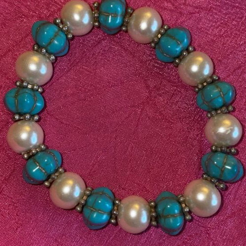 Black bracelet with shiny stones and turquoise pearl bracelet, set of 2