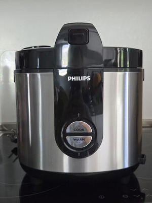 Philips Rice Cooker new, family size, keeps warm 48 hours
