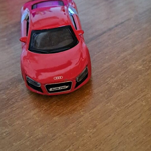 Toy car used, red color