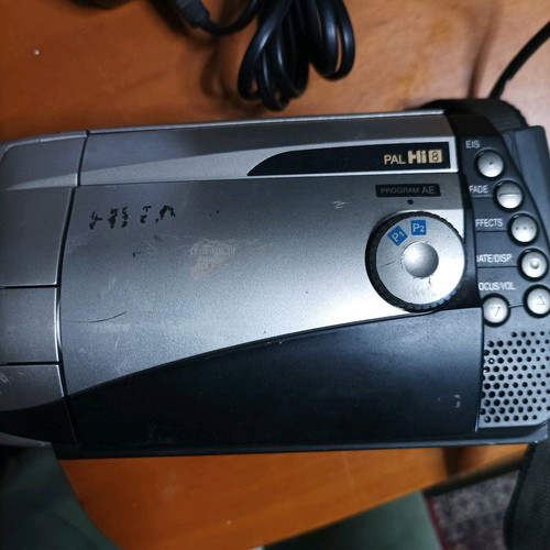 Hitachi video camera used with foldable screen and VHS cassette