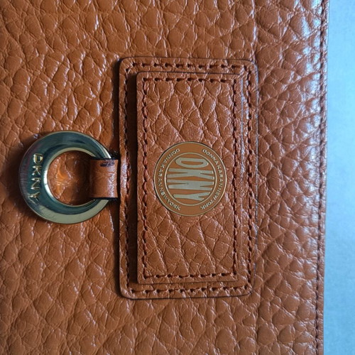DKNY wallet like new in tan color