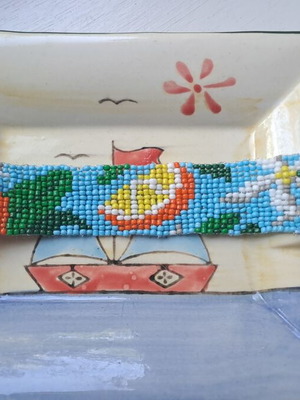 Handmade women's bracelet new with design, blue and yellow