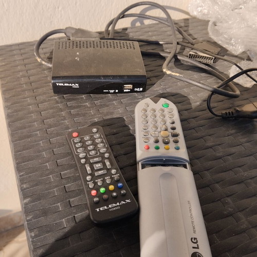 Television with decoder and remote control used, packed ready