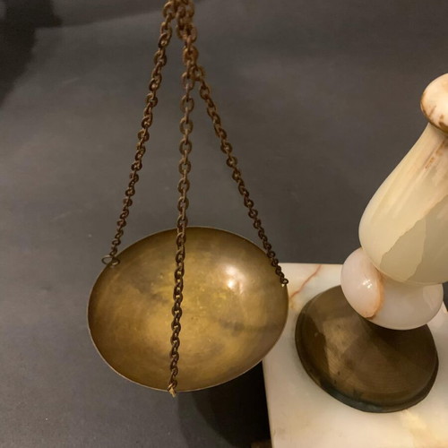Decorative antique scale used with marble base and brass details