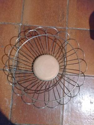Metal bread basket used with clay bottom