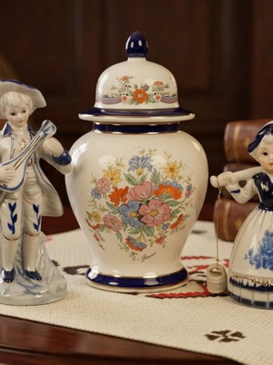 Vintage porcelain decorative set with lidded vase and 2 figurines, 3 pieces