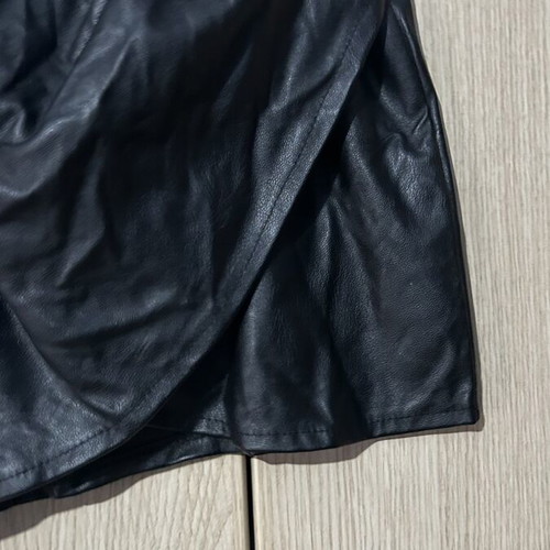 Leather mini skirt with ruching on one back side small used, black