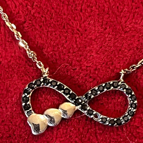 Silver 925 necklace with gold vermeil coating, infinity design with gold hearts, used