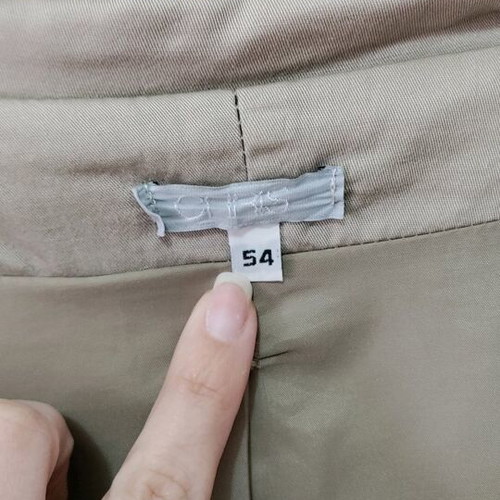 Spring outerwear beige like new, size 54