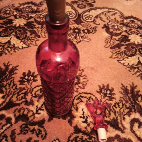 Bottle with LED light like new, blue and red