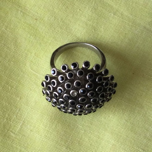 Mushroom-shaped ring with black stones like new