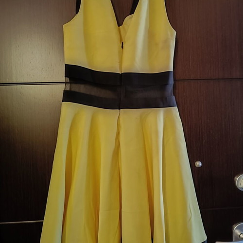 Cocktail dress with transparency at the waist like new, size M