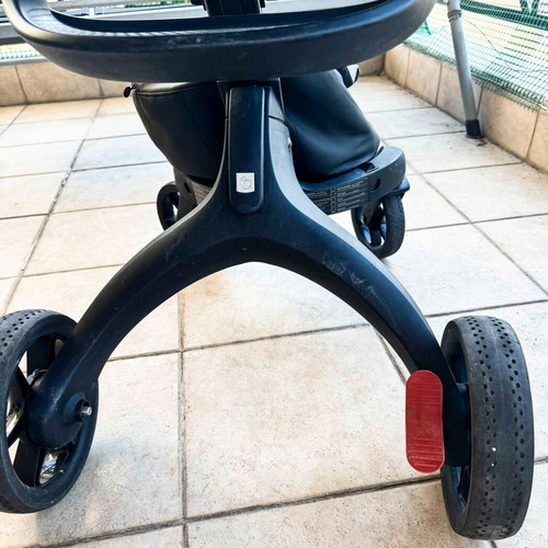 Stokke Xplory X Rich Black stroller used with gift bag set, changing mat, pouch