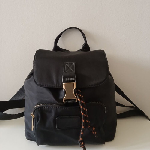 Backpack small women's black like new with gold details
