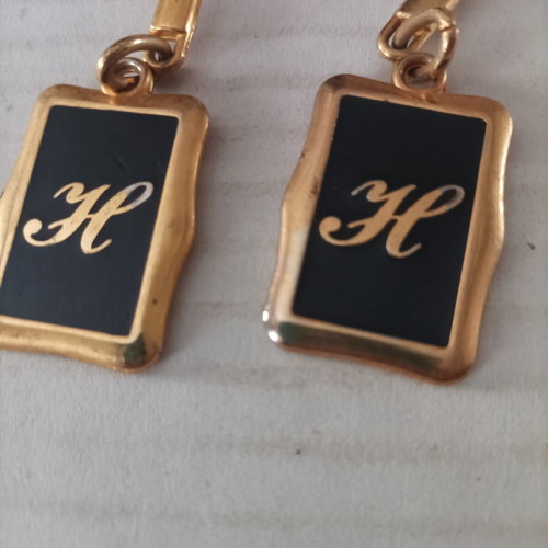 Keychain set 2 pieces with letter H like new