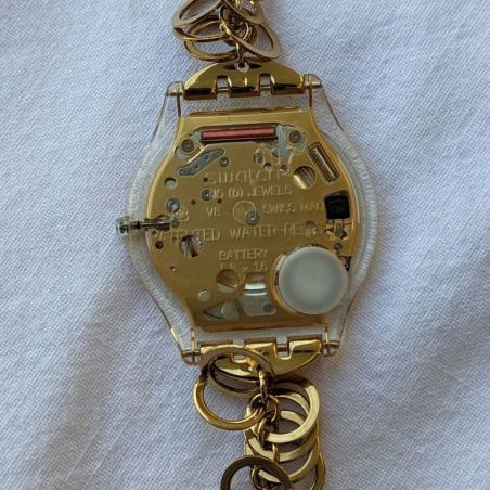 Swatch women's watch used with gold chain strap