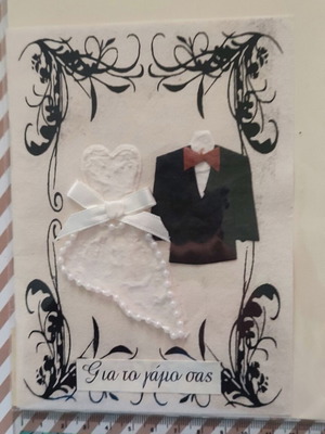 Handmade wedding greeting card with pearls and ribbon