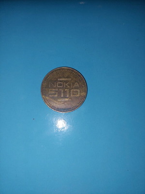 Nokia 5110 coin used with wear on the back side