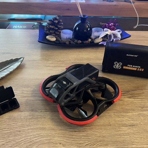 DJI Avata drone used with ND filters, 4 batteries, charger, and extras