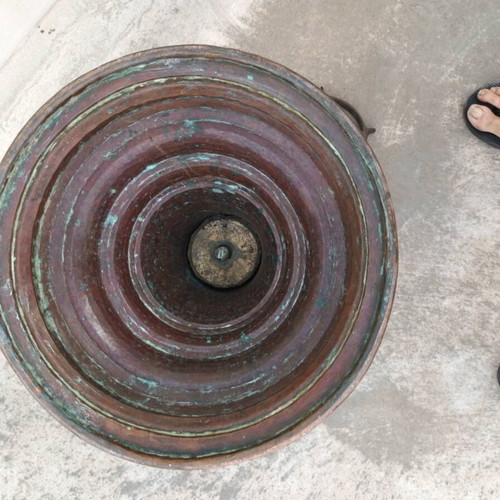 Old copper brazier used with brass handles and decorative bird