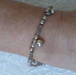 Silver 925 bracelet with hanging hearts and beads, like new