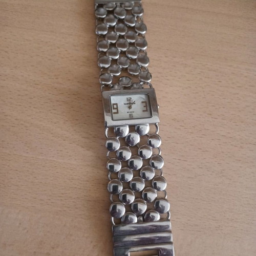 Sandra Felini women's stainless steel watch used