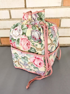 Vintage fabric drawstring bag with floral pattern