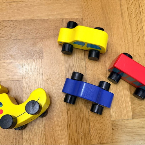 Wooden children's toy cars set of 4 Tiger like new