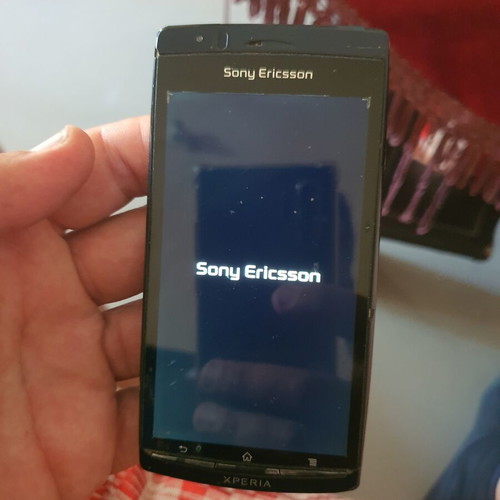 Sony Ericsson Xperia vintage used smartphone with memory card