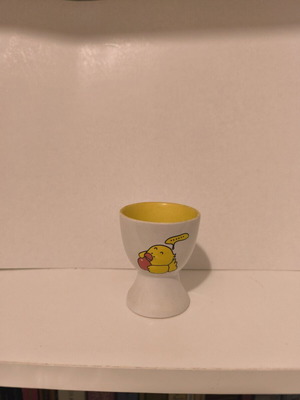 Ceramic egg cup used with minor external wear