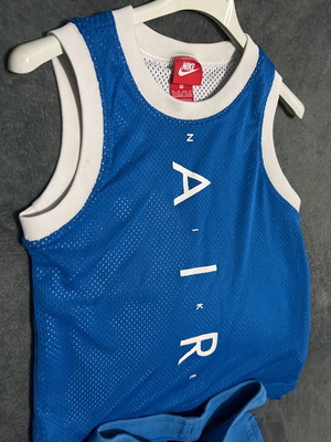 Nike set with almost new shirt and used shorts, white and blue, ages 6-8