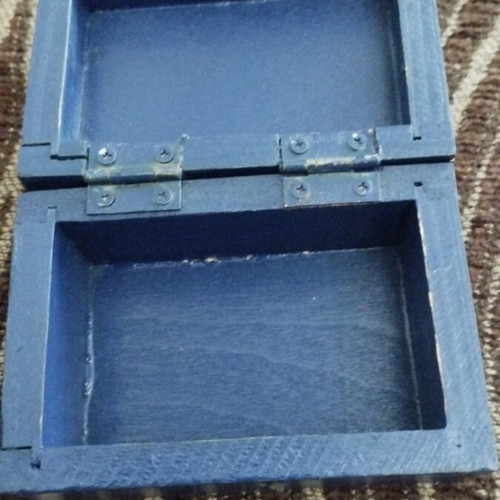 Wooden storage box with nautical design