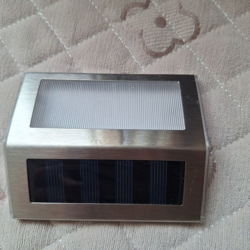 Solar lantern like new, silver with 2 white LED lights