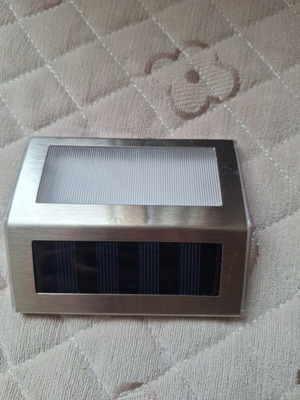 Solar lantern like new, silver with 2 white LED lights