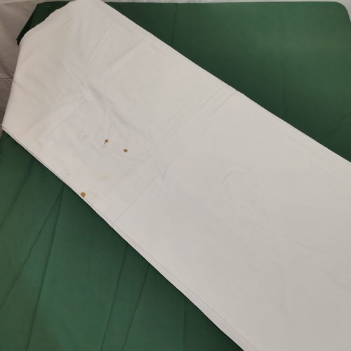 Woven cotton bed sheet used, 1940s vintage with stain