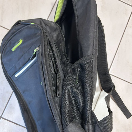 Backpack almost unused, black and green