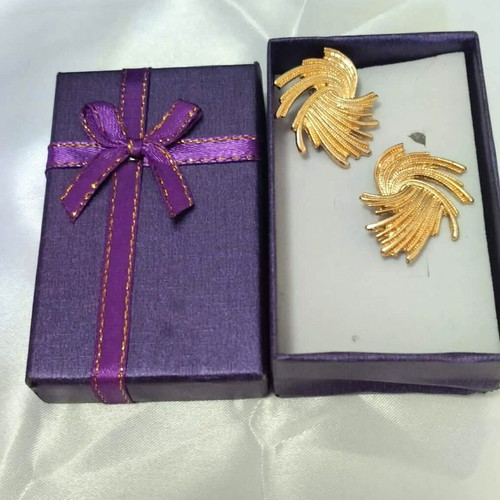 Twisted swirl earrings gold color new