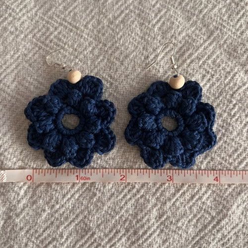 Handmade crochet flower-shaped earrings in navy blue