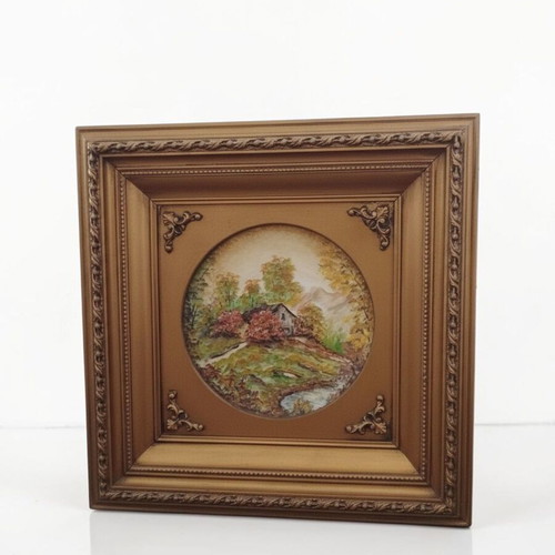 Painted Bavarian porcelain plate with gilded frame like new