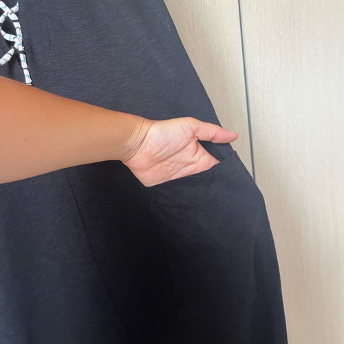 Small cotton salopette used with pockets
