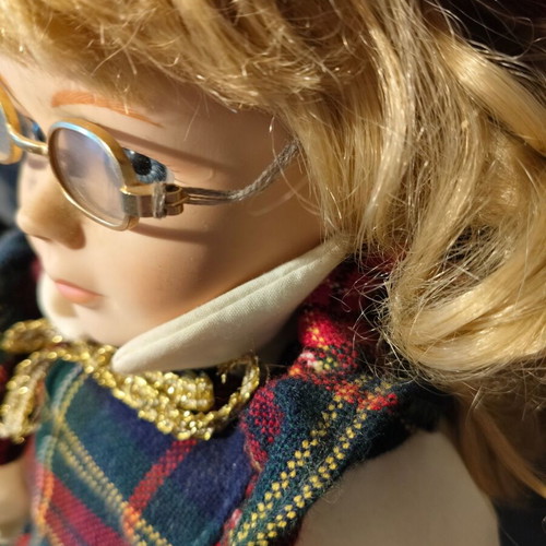 Porcelain doll used in music teacher role