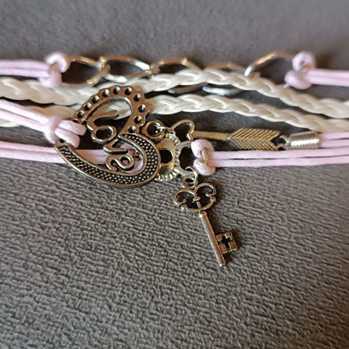 Love bracelet set new with white and pink cords and charms