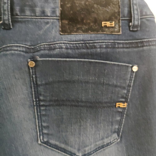 Women's blue jeans used with decorative lace on side size XL