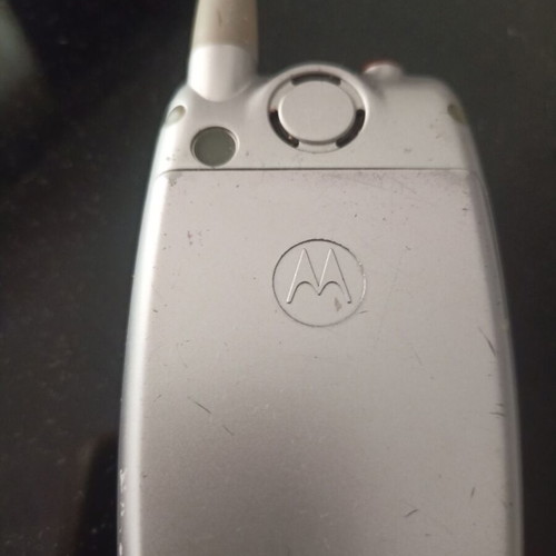 Motorola collectible cell phone like new, silver with flip cover
