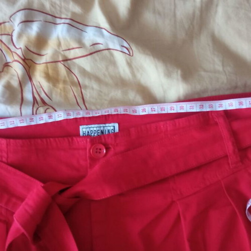 High-waisted red cotton pants, size M