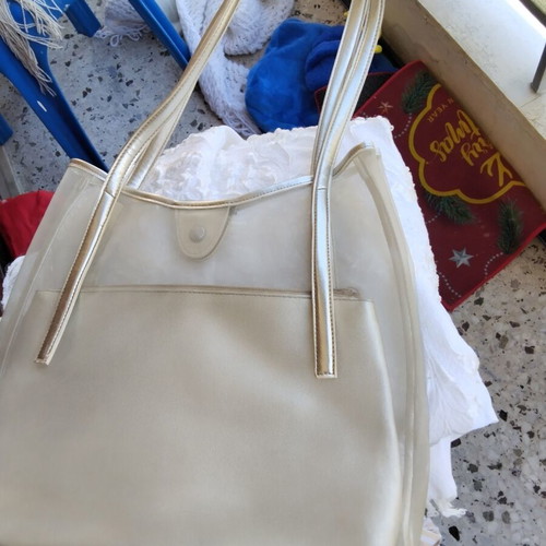 Set of seven multicolor bags including two blue backpacks and one black shoulder bag
